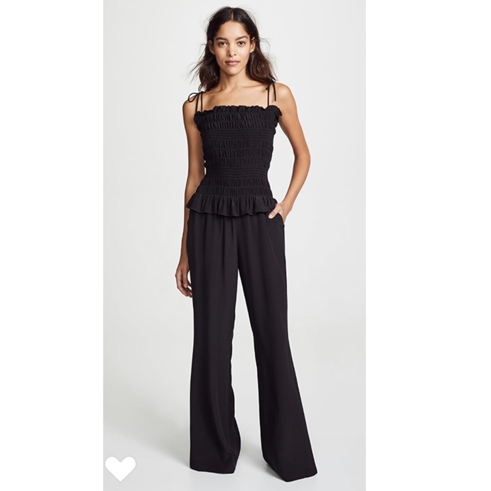 Tory Burch Smocked Jumpsuit in Black.